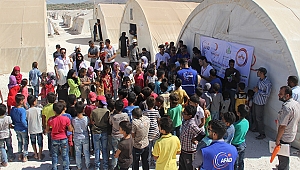  Suriyeli öğrencilere kırtasiye yardımı