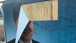 AFİŞE ZARAR VEREN KİŞİ YAKALANDI 