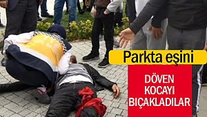 Parkta eşini döven kocayı bıçakladılar