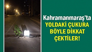Yoldaki çukura böyle dikkat çektiler!