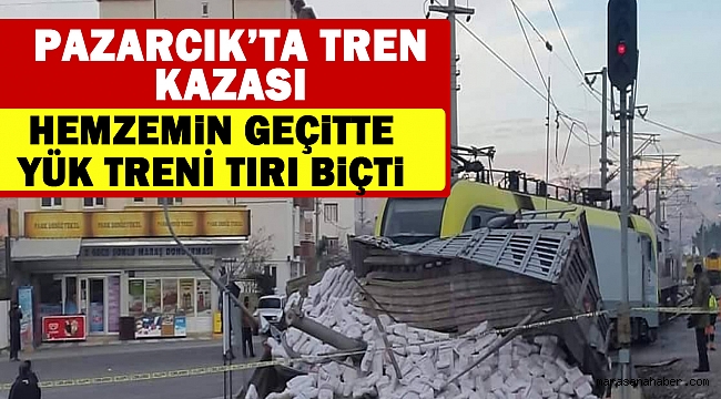 Hemzemin geçitte yük treni tırı biçti