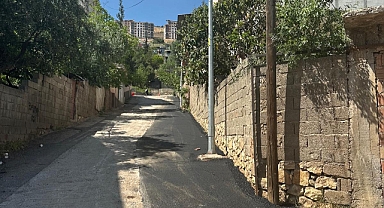 Onikişubat Belediyesi,Mağralı Mahallesi’ndeki yol tahribatlarını gideriyor
