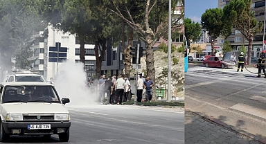 Kahramanmaraş’ta kırmızı ışıkta yanan otomobili esnaflar söndürdü! Araçta bebek de vardı!